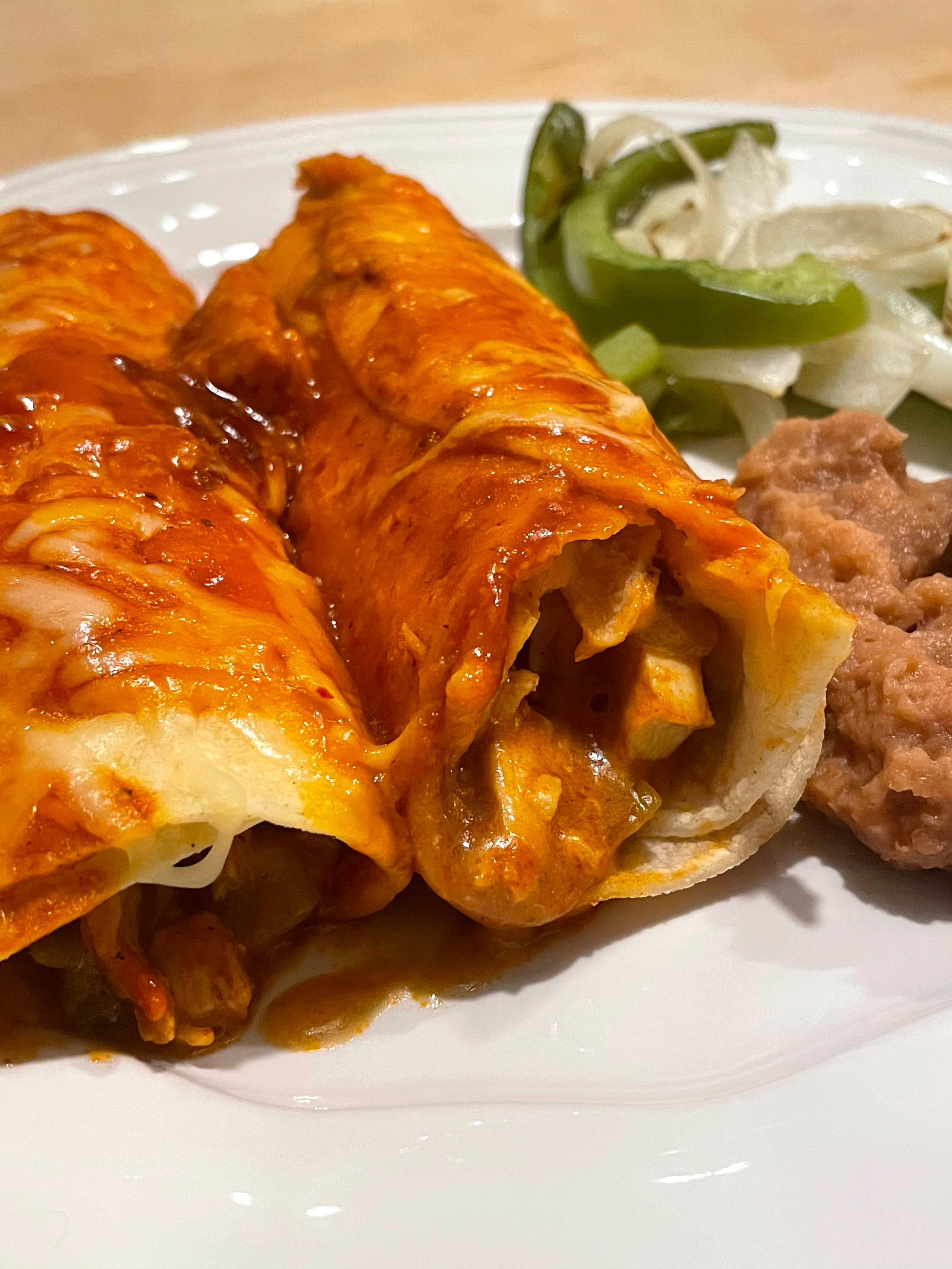 Mexican Enchiladas Refried Beans Green Pepper and Onions