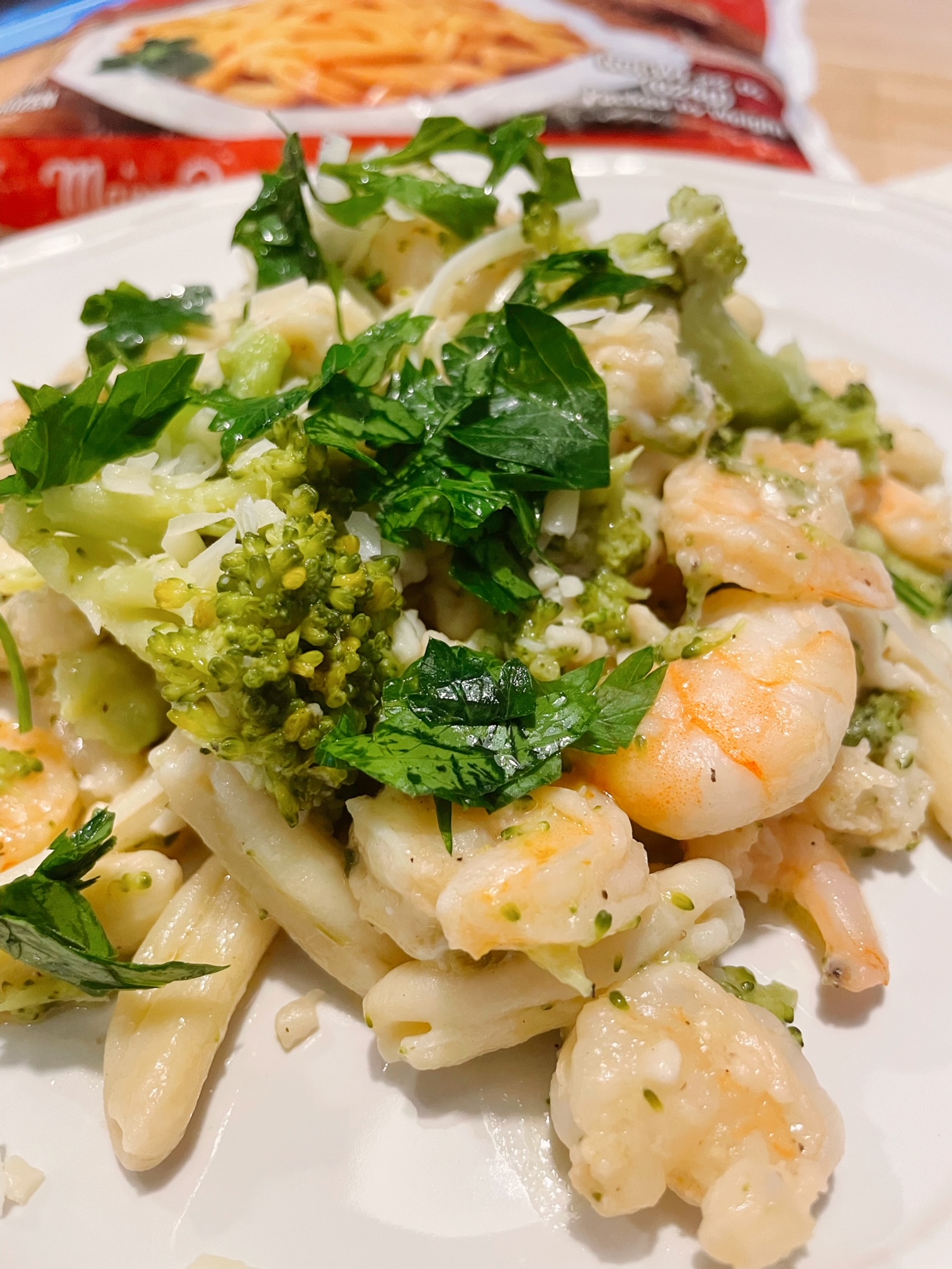 closeup of cavatelli shrimp broccoli olive oil garlic sauce