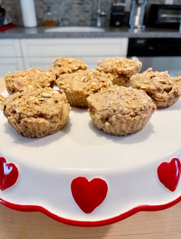Healthy Applesauce Oatmeal Banana Muffins On Cake Stand